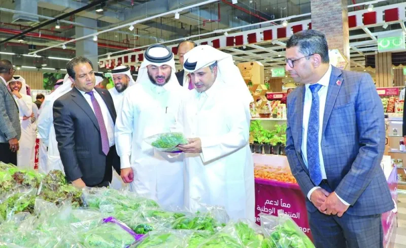 HE Dr Abdullah bin Abdulaziz bin Turki al-Subaie inspects some of the produce on display.