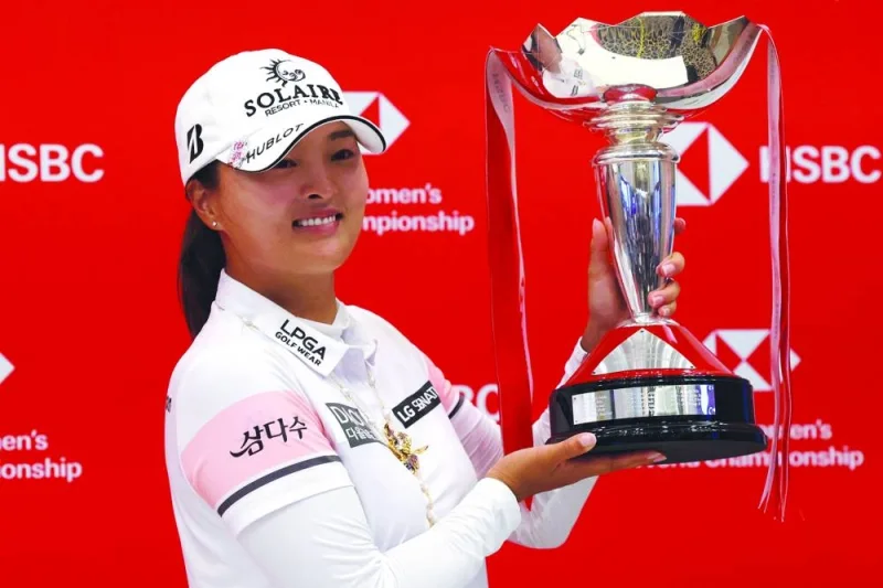 Ko Jin-young of South Korea celebrates after winning the HSBC Women’s World Championship at the Sentosa Golf Club in Singapore yesterday. (AFP)