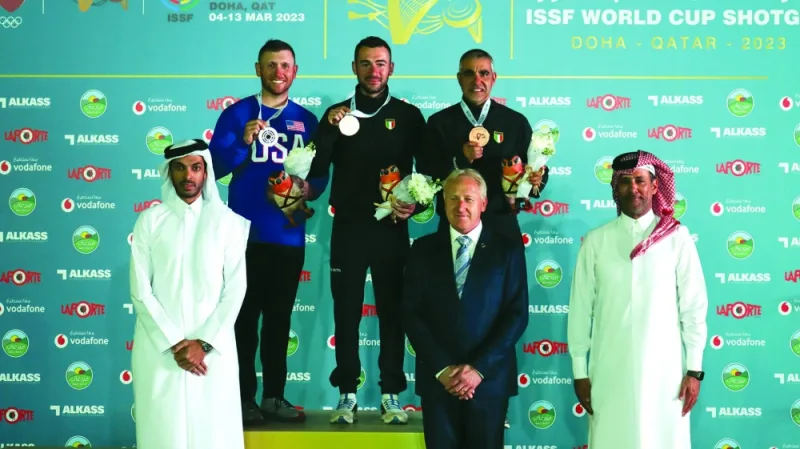International Shooting Sport Federation (ISSF) Secretary-General Willi Grill, Qatar Shooting & Archery Association (QSAA) President Mishaal Ibrahim al-Nasr and QSAA Executive Director Jassim Shaheen al-Sulaiti with the podium winners of Skeet Men at the Lusail Shooting Range yesterday. Italy’s Gabriele Rossetti won the event, followed by American Vincent Hancock in second and Italy’s Luigi Lodde in third.

