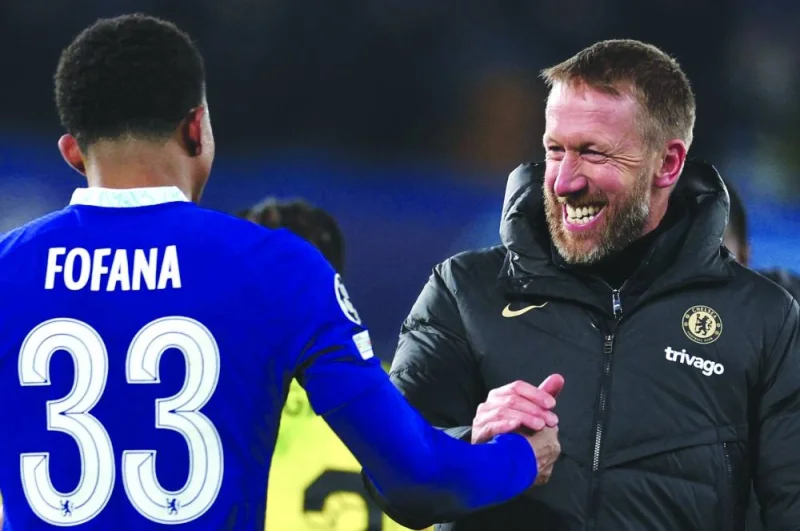 Chelsea’s coach Graham Potter celebrates with defender Wesley Fofana after the UEFA Champions League round of 16 second-leg win overt Borrusia Dortmund at Stamford Bridge in London on Tuesday night. (AFP)