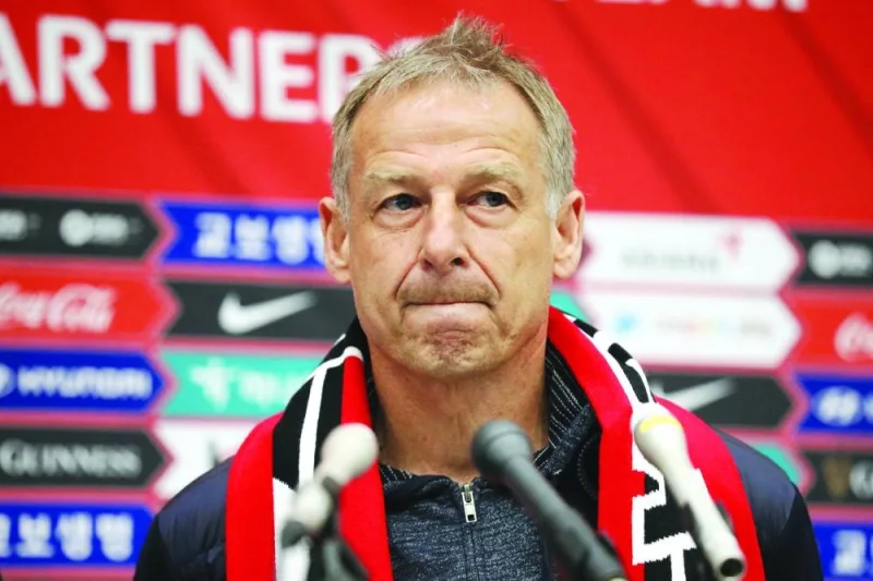 South Korea’s new head coach Jurgen Klinsmann speaks upon his arrival in Incheon, South Korea, yesterday. (Reuters)