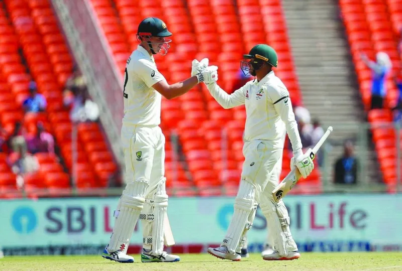 Australia’s Cameron Green (left) and Usman Khawaja shared a 208-run fifth-wicket partnership during the fourth Test against India in Ahmedabad. (Reuters)
