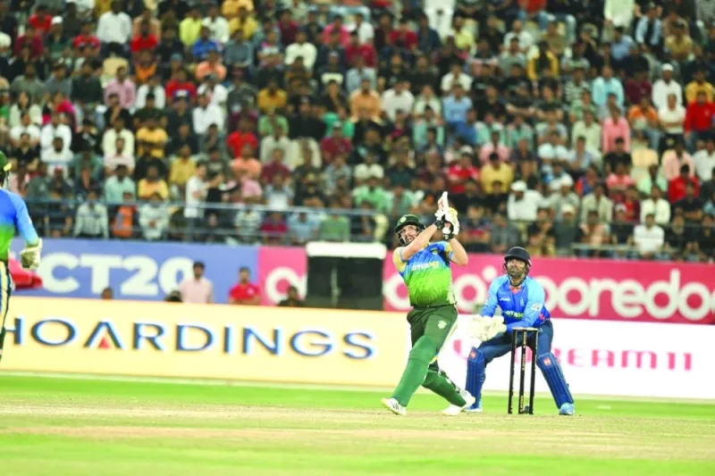 Asia Lions&#039; Misbah-ul-Haq plays a shot during the LLC Masters T20 match against India Maharajas at the Asian Town International Stadium in Doha on Friday.