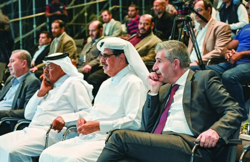 HE Dr Hamad bin Abdulaziz al-Kawari, Dr Ahmad M Hasnah with other dignitaries at the event.