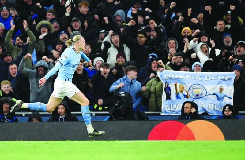 Manchester City’s Erling Haaland celebrates after scoring against RB Leipzig in Champions League last 16 match. (AFP)