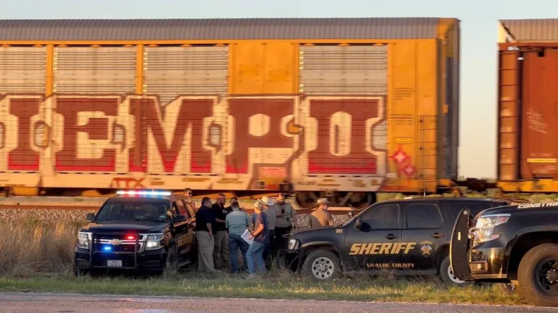 Members of the police work, after two migrants suffocated to death aboard a freight train that got derailed, in Uvalde, Texas, US, March 24, 2023, in this screengrab obtained from a social media video.  (Joey Palacios via REUTERS)