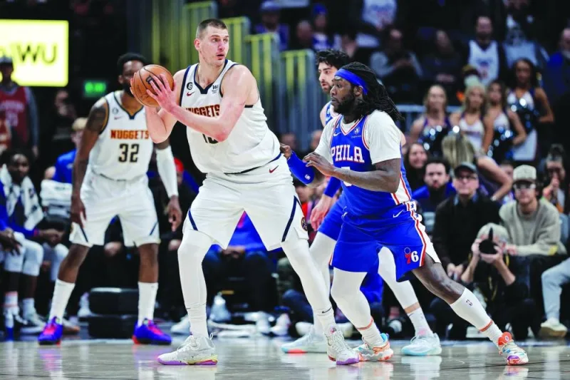 Denver Nuggets’ Nikola Jokic controls the ball as Philadelphia 76ers Montrezl Harrell guards in the fourth quarter of their NBA game at the Ball Arena in Denver. (USA TODAY Sports)