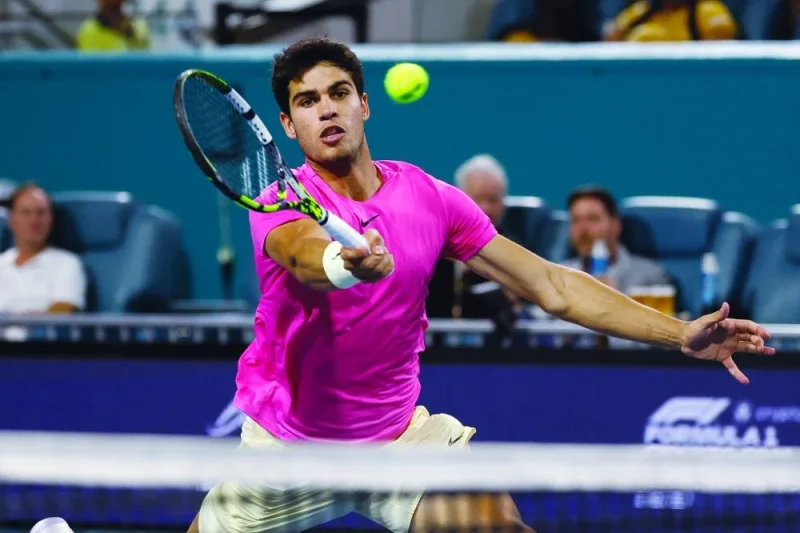 Carlos Alcaraz of Spain hits a volley against Taylor Fritz of the US (not pictured) in their singles quarter-final on day 11 of the Miami Open at Hard Rock Stadium. (USA TODAY Sports)