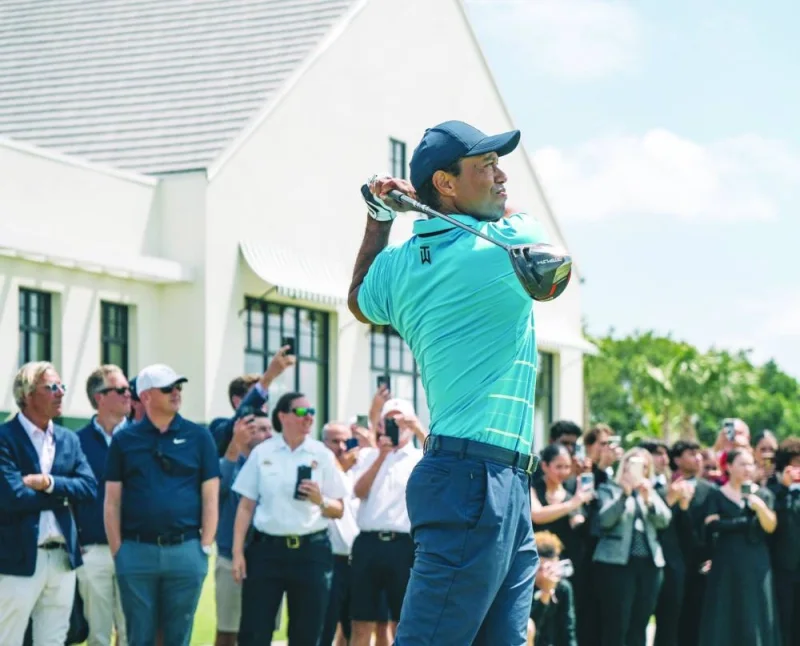 Tiger Woods of the US hits the first tee shot at The Park, a public golf course for the community of West Palm Beach. (@TigerWoods)