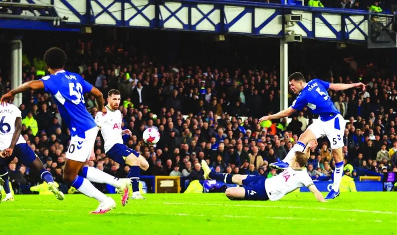 Everton’s Michael Keane scores against Tottenham Hotspur during the Premier League match in Liverpool. (Reuters)