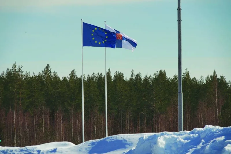 PARADIGM SHIFT: The Finnish and European Union flags flutter at the border crossing between Finland and Russia as the former became member of Nato, in Vaalimaa, Finland. (Reuters)