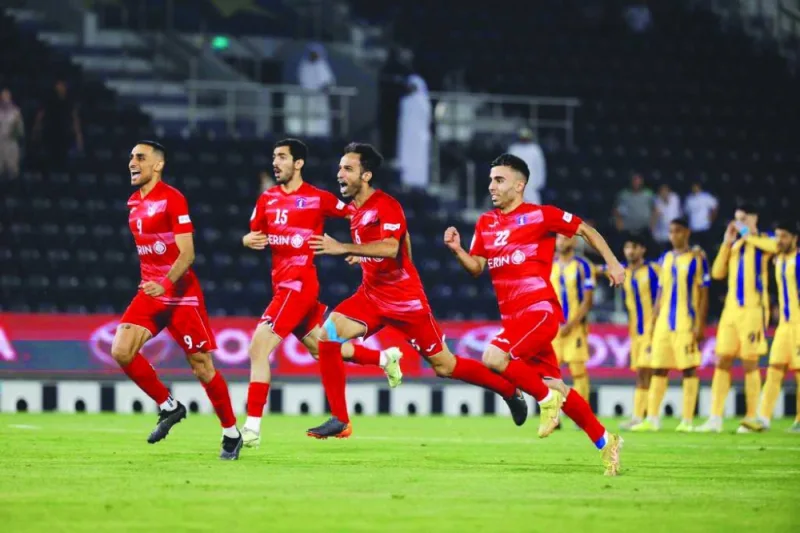 Al Shahania players celebrate after beating Al Gharafa to reach the Amir Cup semi-finals following a thrilling penalty shoot-out 4-3 victory on Sunday.