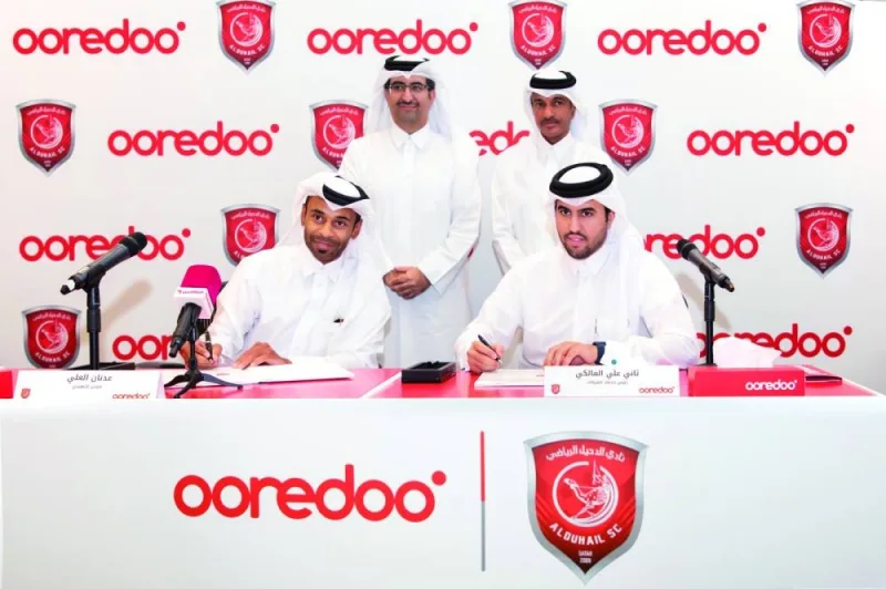 Ooredoo Chief Business Officer Thani al-Malki and Executive director of Al Duhail SC Adnan al-Ali sign the sponsorship agreement on Wednesday.