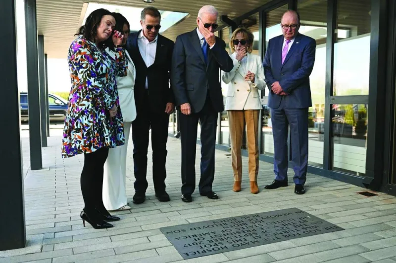 Laurita Blewitt (left) cousin of US President Joe Biden, Hunter Biden (third left), Mike Smith (right), Chairman and Martina Jennings 
(second left), CEO of Mayo Roscommon Hospice Foundation and Valerie Biden Owens (second right) view a plaque to President Biden’s late son Beau, outside Mayo Roscommon Hospice and Palliative Care Centre, in the West of Ireland, on Friday.