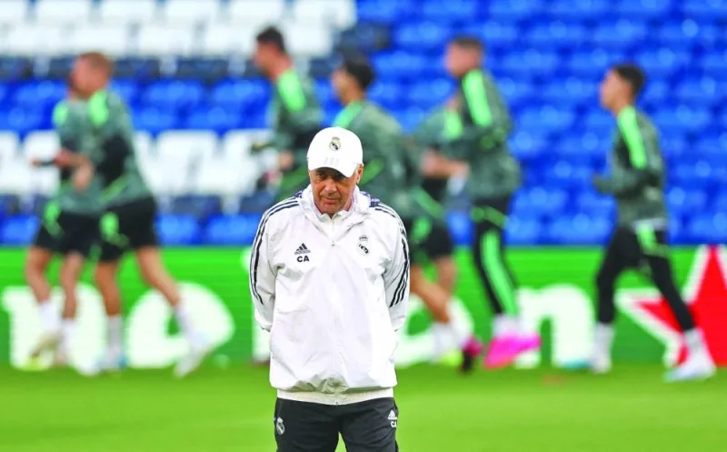 Real Madrid coach Carlo Ancelotti at his team’s training session in London yesterday. (Reuters)