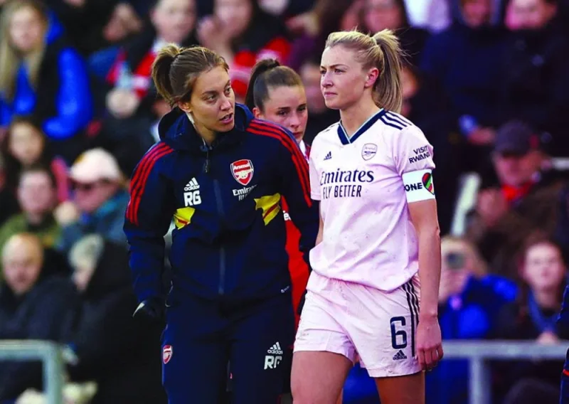 Arsenal’s Leah Williamson (right) sustained an anterior cruciate ligament injury during the Women’s Super League match against Manchester United on Wednesday. (Reuters)