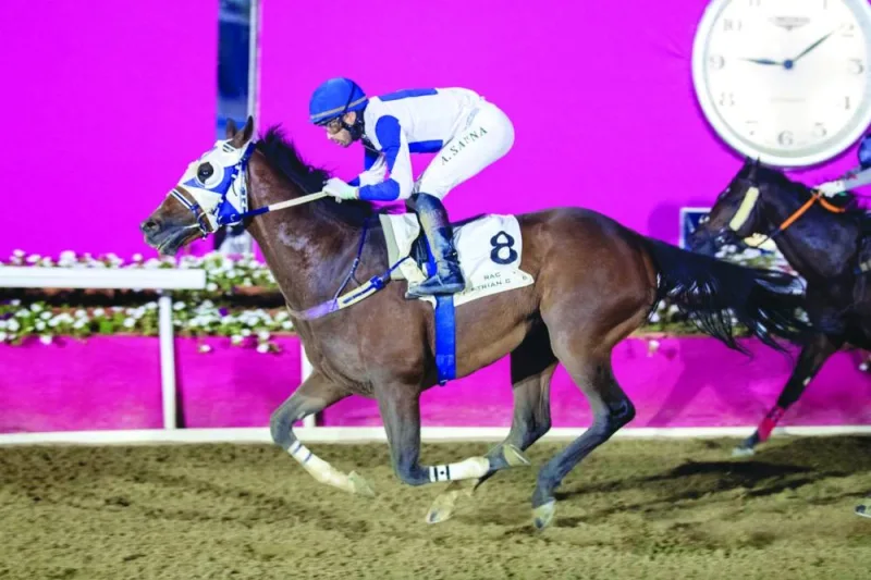Jockey Alberto Sanna guides Saqr to Al Jumayliyah Cup victory at Al Rayyan Racecourse yesterday. PICTURE: Juhaim