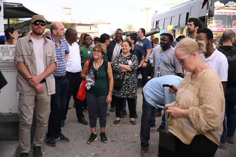 Internationally-recruited personnel of the United Nations Integrated Transition Assistance Mission in Sudan are evacuated from Port Sudan.  AFP
