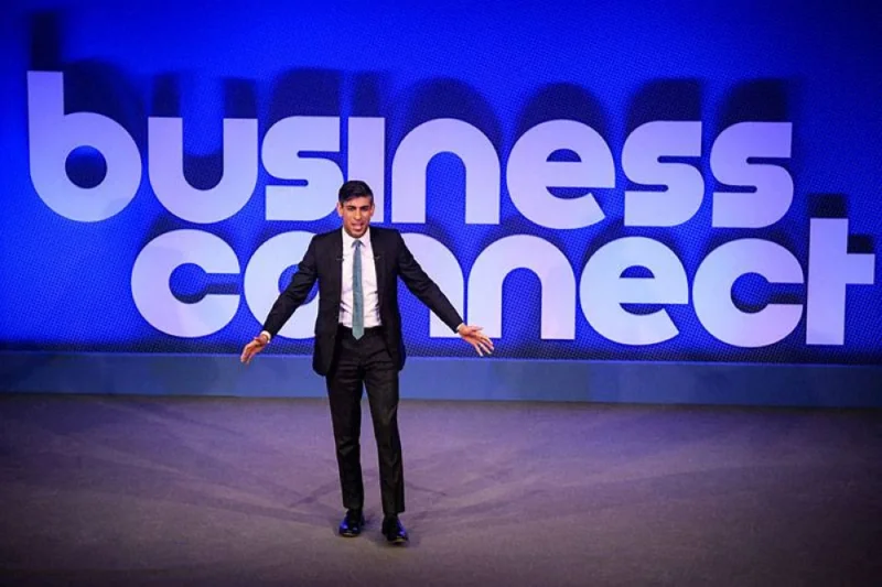 Britain&#039;s Prime Minister Rishi Sunak delivers a speech on stage as he hosts a Business Connect event in North London on Monday. (Reuters)
