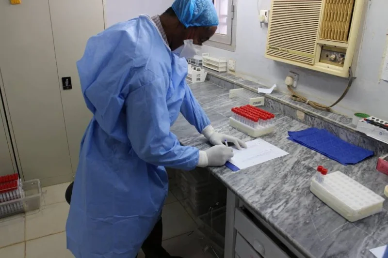 A staff member works at National Public Health Laboratory in Khartoum, Sudan in this undated image posted to social media on December 31, 2020. National Public Health Laboratory - Sudan/Handout via REUTERS.