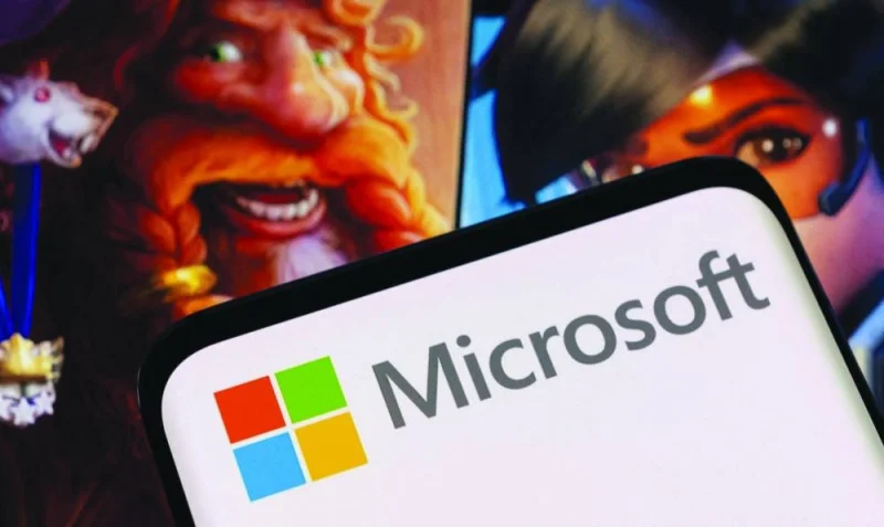Microsoft logo is seen on a smartphone placed on displayed Activision Blizzard’s games characters in an illustration. Britain yesterday blocked Microsoft’s $69bn takeover of US video game giant Activision Blizzard, arguing it would harm competition in cloud gaming.