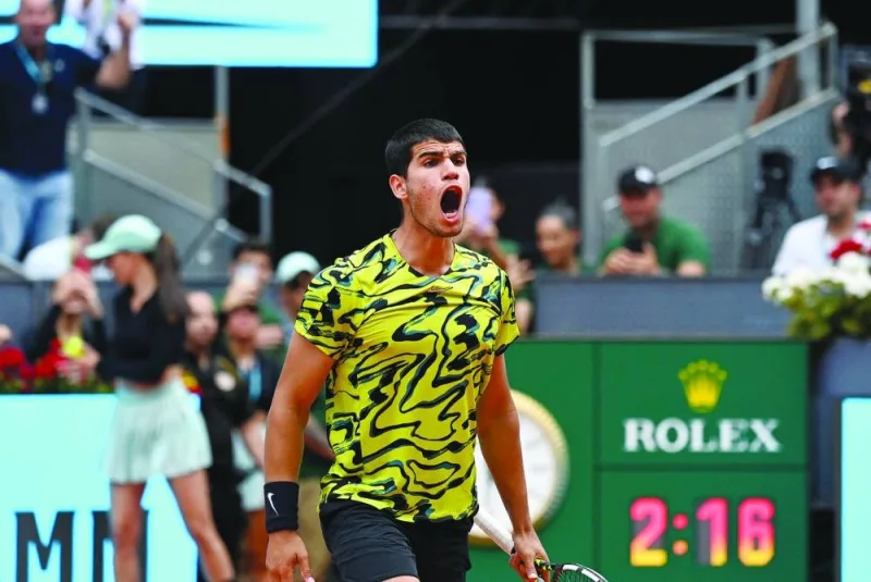 Spain’s Carlos Alcaraz reacts after winning his Madrid Open match against Finland’s Emil Ruusuvuori in Madrid on Friday. (AFP)