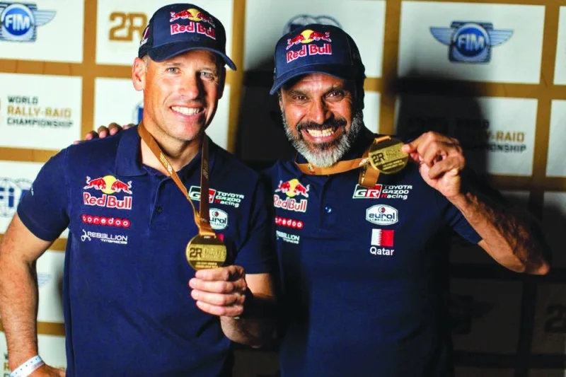 Nasser Saleh al-Attiyah (right) with French co-driver Mathieu Baumel.