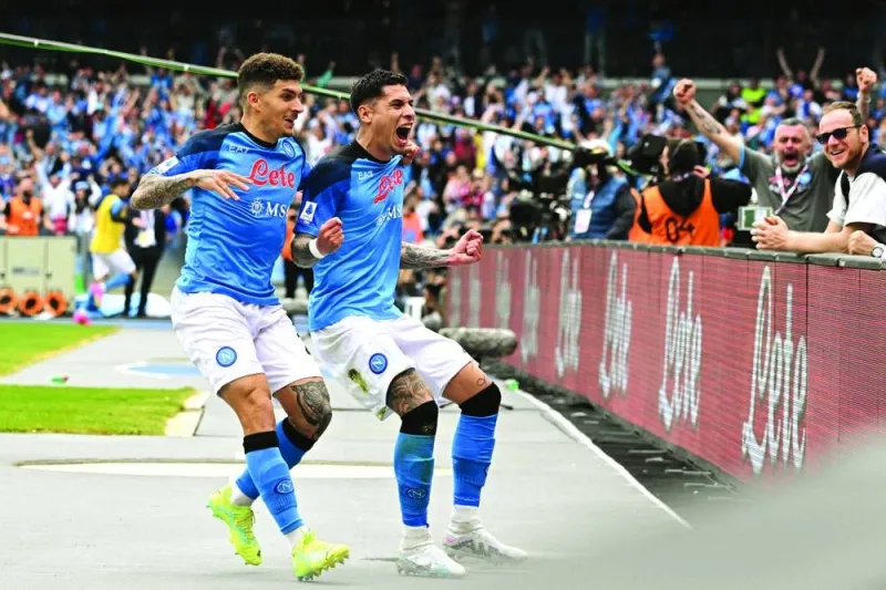 Napoli’s Mathias Olivera celebrates with teammate Giovanni di Lorenzo after opening the scoring during the Italian Serie A match against Salernitana in Naples yesterday. (AFP)