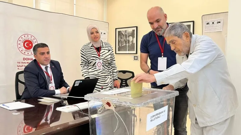 Turkish voters living in Qatar headed to the polls Monday to cast their votes
