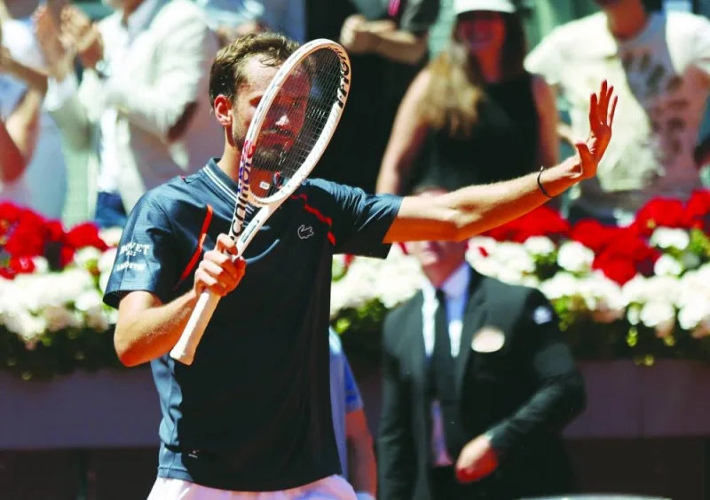 Russia’s Daniil Medvedev celebrates after winning his Round of 32 match against comptariot Alexander Shevchenko at the Madrid Open yesterday. (Reuters)