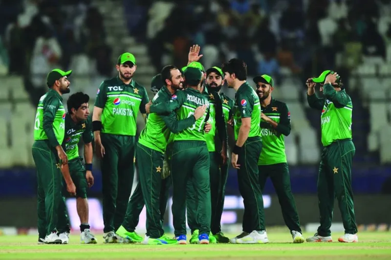 Pakistan’s cricketers celebrate after the dismissal of New Zealand’s Henry Nicholls (not pictured) during the third one-day international in Karachi on Wednesday. (AFP)