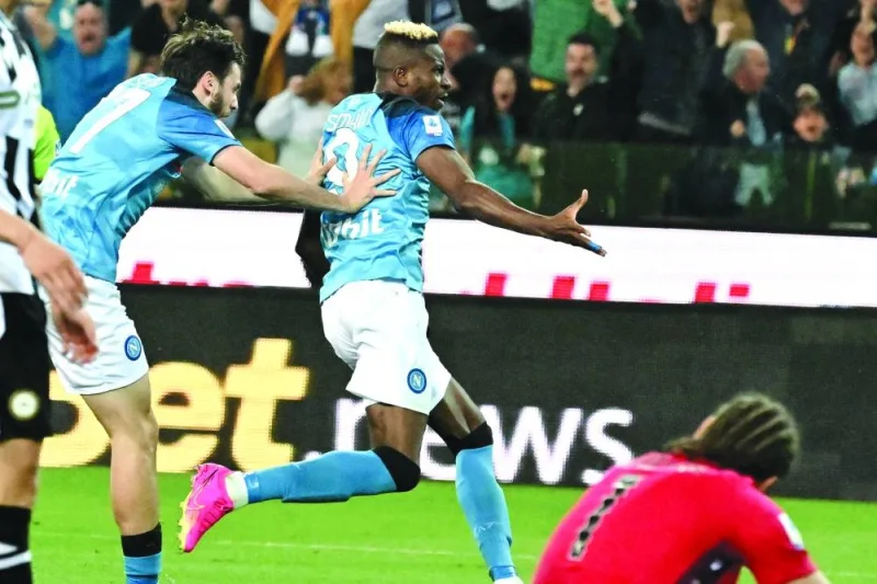 Napoli’s Victor Osimhen celebrates after scoring an equaliser during the Italian Serie A match against Udinese at Friuli Stadium in Udine on Thursday. (AFP)