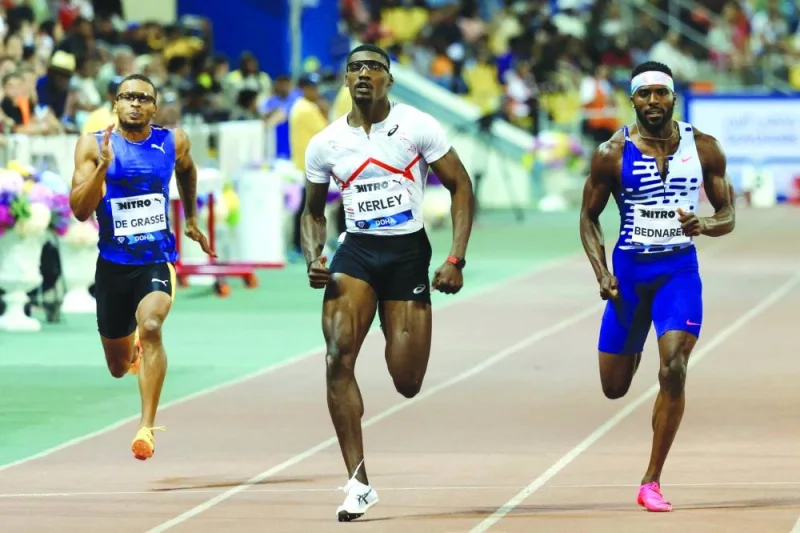 USA’s Fred Kerley (centre) sprints to men’s 200m victory ahead of compatriot Kenneth Bednarek (right) and Canadian Andre De Grasse 
during the Doha Diamond League at the Suheim Bin Hamad Stadium on Friday. (AFP)