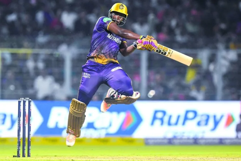 Kolkata Knight Riders’ Andre Russell plays a shot during the IPL match against Punjab Kings at the the Eden Gardens Stadium in Kolkata yesterday. (AFP)
