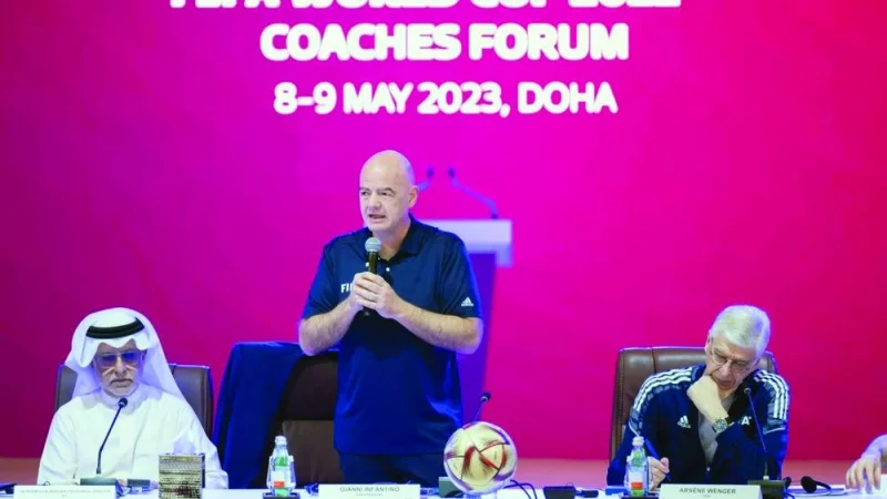 
FIFA President Gianni Infantino (centre) speaks during the coaches forum in Doha yesterday, as FIFA’s Chief of Global Football Development Arsene Wenger (right) and Asian Football Confederation President Shaikh Salman bin Ebrahim al-Khalifah look on. 
