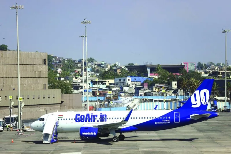 
A Go First airline, formerly known as GoAir, passenger aircraft is parked at the Chhatrapati Shivaji International Airport in Mumbai on May 3. The clamour for Go Air’s assets may complicate its bid to restructure debt and restart operations. 