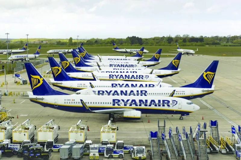 
Passenger aircraft, operated by Ryanair Holdings, on the tarmac at London Stansted Airport. Boeing Co secured a landmark order from one of its most important customers, with Ryanair agreeing to purchase as many as 300 of the company’s largest 737 Max aircraft in a bet on the post-pandemic travel recovery. 