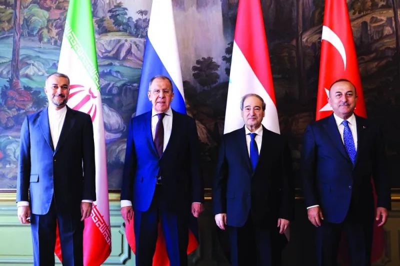 Foreign ministers Hossein Amir-Abdollahian of Iran, Sergei Lavrov of Russia, Faisal Mekdad of Syria and Mevlut Cavusoglu of Turkiye pose for a picture during a meeting in Moscow, yesterday.