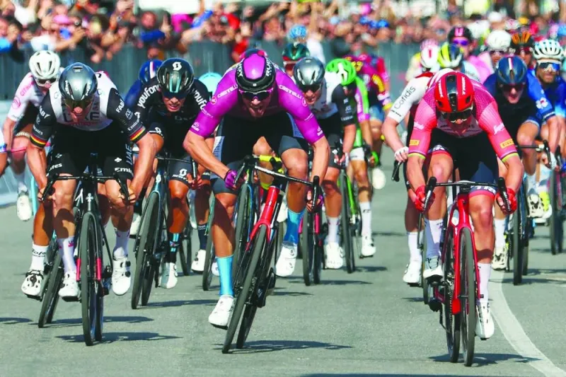 Trek-Segafredo’s Danish rider Mads Pedersen (right) sprints ahead of second-placed Bahrain-Victorious’s Italian rider Jonathan Milan (centre) and third-placed UAE Team Emirates’s German rider Pascal Ackermann (left) to the finish line to win the sixth stage of Giro d’Italia on Thursday. (AFP)