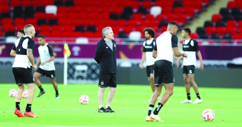 Coach Juanma Lillo looks on as Al Sadd players train at the Ahmed bin Ali Stadium on Thursday, on the eve of the Amir Cup final against Al Arabi.
