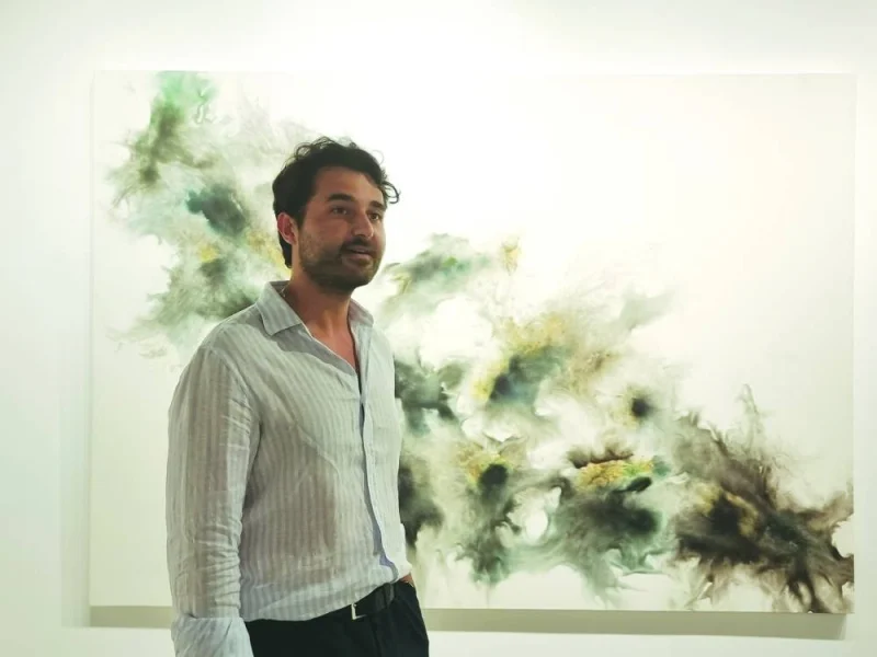 Garo Bardakjaian showcases Jean Boghossian&#039;s work, titled ‘Ready, Aim, Fire’, at the exhibition. PICTURES: Joey Aguilar