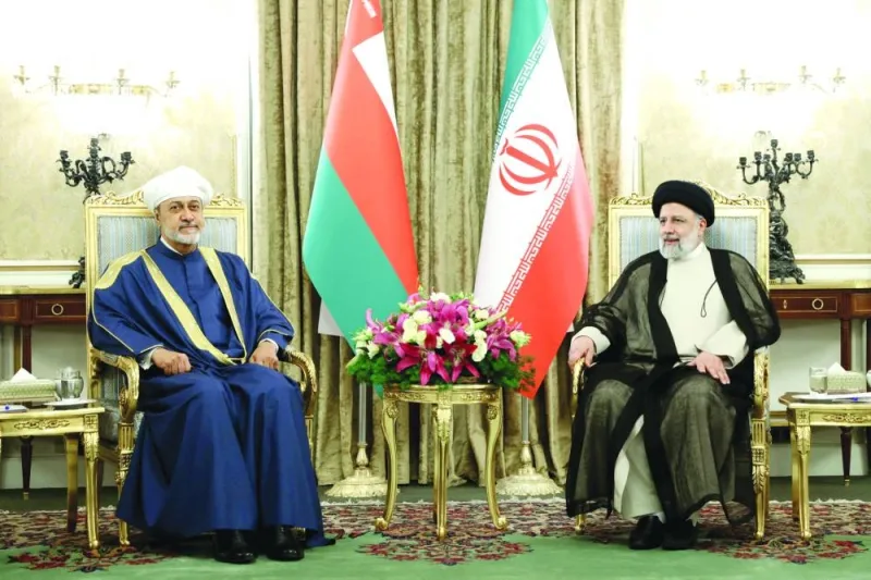 Iranian President Ebrahim Raisi meets with Oman’s Sultan Haitham bin Tariq in Tehran, on Sunday.