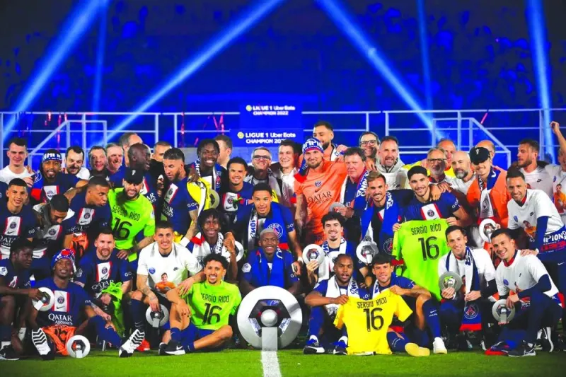 
Paris Saint-Germain players celebrate after wining Ligue 1 trophy at the Parc des Princes Stadium in Paris. (AFP) 
