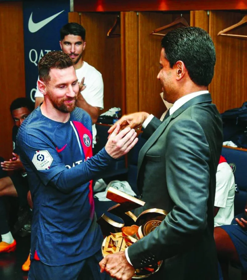 
PSG president Nasser al-Khelaifi with Lionel Messi after winning the title. 