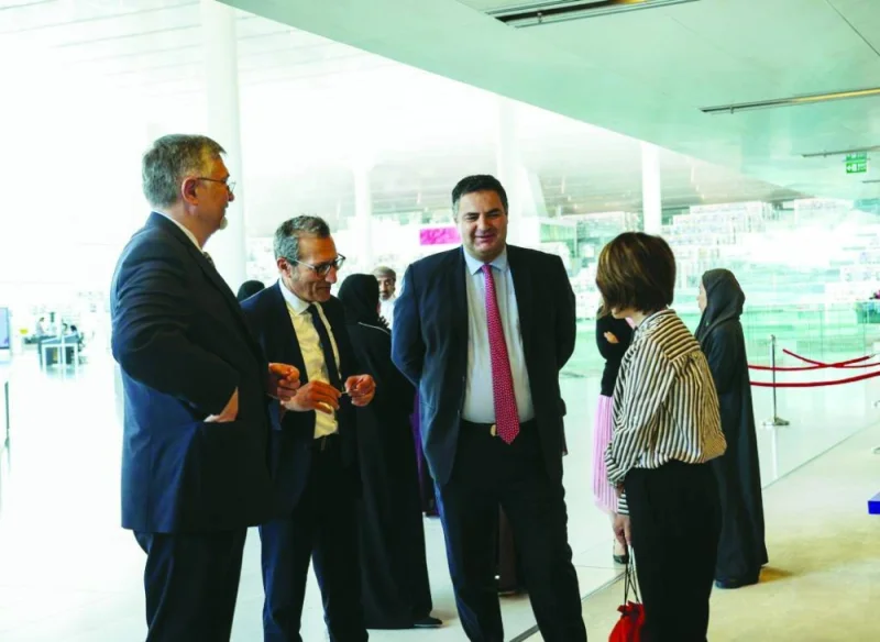 Georgian ambassador to Qatar Nikoloz Revazishvili and QNL executive director Tan Huism at the opening of the exhibition.
