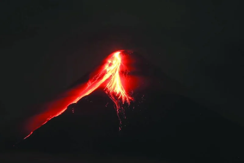 
Mount Mayon spews lava during an eruption yesterday near Legazpi city in Albay province, south of Manila. 