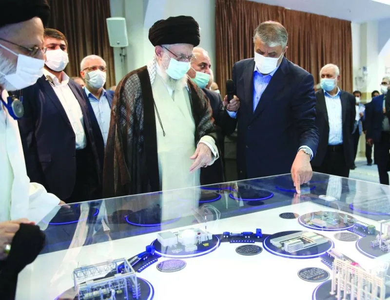 Iran’s Supreme Leader Ayatollah Ali Khamenei views a model of a nuclear facility, in Tehran, on Sunday.