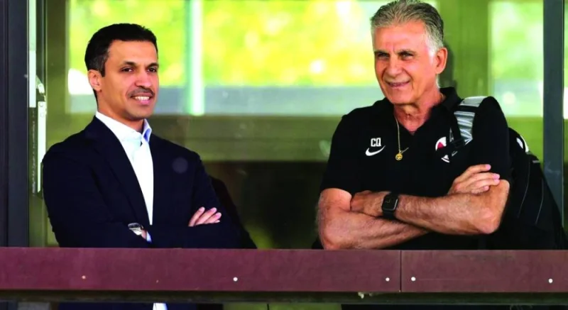 Qatar Football Association president Jassim bin Rashid al-Buenain (left) with Qatar coach Carlos Queiroz.