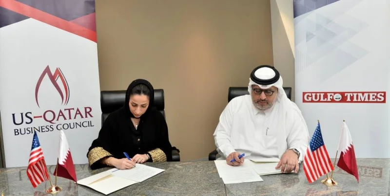 Sheikha Mayes bint Hamad al-Thani, USQBC Doha Managing Director, and Faisal Abdulhameed al-Mudahka, Editor-in-Chief of Gulf Times, signing the MoU at USQBC’s headquarters in West Bay. PICTURE: Shaji Kayamkulam