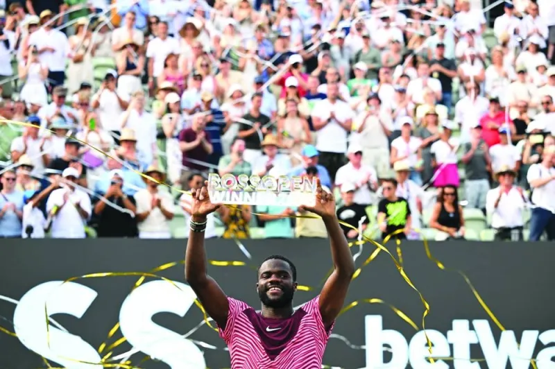 
Frances Tiafoe of the US celebrates with a trophy after winning the Stuttgart Open final against Germany’s Jan-Lennard Struff. (Reuters) 